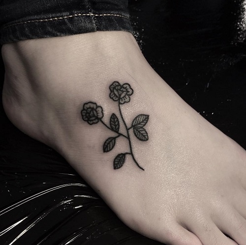black rose foot tattoo